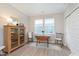 Bright dining area featuring a wooden table, a cabinet, and a window with natural light at 796 Sapp Cir, Westfield, IN 46074