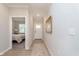 Bright hallway with wood floors and a view into the bedroom, offering a welcoming and open transition at 796 Sapp Cir, Westfield, IN 46074