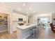 Bright, open kitchen features a large island with bar seating and a walk-in pantry at 796 Sapp Cir, Westfield, IN 46074