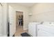 Functional laundry room with washer, dryer, and closet space, providing convenience at 796 Sapp Cir, Westfield, IN 46074