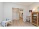 Open-concept space with hardwood floors leading to kitchen, enhancing flow and functionality at 796 Sapp Cir, Westfield, IN 46074