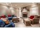 Inviting living room with fireplace, comfortable seating, and elegant decor at 8103 N Pennsylvania St, Indianapolis, IN 46240