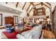 Open-concept living area with hardwood floors, custom cabinetry, and comfortable seating at 8103 N Pennsylvania St, Indianapolis, IN 46240