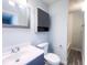 Bathroom features a modern vanity, updated lighting, and a combination tub and shower at 8350 Paso Del Norte Ct, Indianapolis, IN 46227
