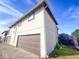 Two-story home boasting a brown garage door, inviting curb appeal, and a well-maintained exterior at 8350 Paso Del Norte Ct, Indianapolis, IN 46227
