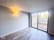Living room featuring sliding glass doors providing ample natural light at 8350 Paso Del Norte Ct, Indianapolis, IN 46227