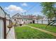 Well-maintained backyard featuring a spacious lawn and a patio area perfect for outdoor relaxation at 842 Miller Ave, Shelbyville, IN 46176