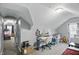 Bedroom with carpet flooring, sloped ceilings, closet space, and a small desk at 842 Miller Ave, Shelbyville, IN 46176