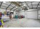 Spacious and well-lit garage interior with ample room for storage and projects at 842 Miller Ave, Shelbyville, IN 46176