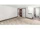 Carpeted bedroom with multiple doorways leading to other areas of the home at 8814 E 146Th St, Noblesville, IN 46060