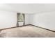 Simple bedroom with neutral carpet and a window providing natural light at 8814 E 146Th St, Noblesville, IN 46060