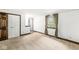 Cozy bedroom offers natural light through a window and double doors to closet at 8814 E 146Th St, Noblesville, IN 46060