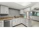 Sunlit kitchen with wood-look countertops and updated stainless steel appliances offering a modern space for cooking at 8814 E 146Th St, Noblesville, IN 46060