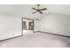 Bright living room features plush carpet and an open doorway to adjoining rooms at 8814 E 146Th St, Noblesville, IN 46060
