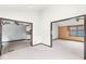 Bright living space featuring open access to the kitchen and an additional room with large windows and outdoor views at 8814 E 146Th St, Noblesville, IN 46060