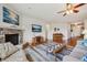 Comfortable living room with a fireplace and lots of natural light at 8855 Banner Dr, Brownsburg, IN 46112