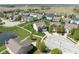 Charming neighborhood with well-maintained lawns, sidewalks, and a tranquil pond at 996 Denton Ct, Westfield, IN 46074
