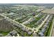 Aerial view of a neighborhood, pond, walking trail, and nicely landscaped yards at 996 Denton Ct, Westfield, IN 46074
