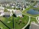 Aerial shot of a home with a big backyard and nearby pond along the walking trail at 996 Denton Ct, Westfield, IN 46074