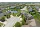 Bird's eye view of cul-de-sac homes with mature trees and well-kept landscaping near a pond at 996 Denton Ct, Westfield, IN 46074
