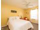 Inviting bedroom with a ceiling fan, bright yellow walls, and cozy decor for a comfortable stay at 996 Denton Ct, Westfield, IN 46074
