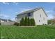 Exterior of the home featuring a well-maintained lawn and mature landscaping at 996 Denton Ct, Westfield, IN 46074