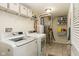 Laundry room featuring a washer and dryer, shelf, and ample space for laundry tasks at 996 Denton Ct, Westfield, IN 46074