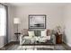 Cozy living room featuring a comfortable sofa, decorative pillows, stylish decor, and natural light at 996 Denton Ct, Westfield, IN 46074
