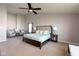 Spacious main bedroom features a large bed, sitting area, and neutral paint at 996 Denton Ct, Westfield, IN 46074