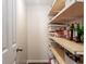 A well-organized pantry offers shelving and storage for convenient kitchen organization at 996 Denton Ct, Westfield, IN 46074
