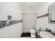 This bathroom offers a shower, toilet, sink and marble style design at 10090 Eagle Eye Way, Indianapolis, IN 46234