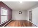 Bright, spacious bedroom featuring hardwood floors, a window, and neutral tones at 10090 Eagle Eye Way, Indianapolis, IN 46234