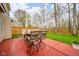 Relaxing outdoor patio area, ideal for dining and entertaining, with a table and chairs at 10090 Eagle Eye Way, Indianapolis, IN 46234
