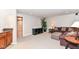 Finished basement offers a cozy seating area with an L-shaped sectional at 10524 Hawks Ridge Ct, Fishers, IN 46037