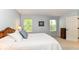 Comfortable main bedroom with natural light, neutral tones, and pleasant outdoor view at 10524 Hawks Ridge Ct, Fishers, IN 46037