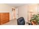 A home office featuring a wood desk and a neutral carpeted floor at 10524 Hawks Ridge Ct, Fishers, IN 46037