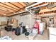 Unfinished basement is being used for storage with concrete walls at 10524 Hawks Ridge Ct, Fishers, IN 46037