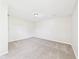Empty carpeted bedroom with a neutral color palette, providing a blank canvas for personalization at 108 W Cross St, Anderson, IN 46012