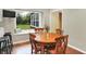 Breakfast nook features hardwood floors, and a large window with a view of the backyard at 1095 Williamsburg Ln, Zionsville, IN 46077