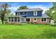 Large home with a beautiful yard and sunroom at 1095 Williamsburg Ln, Zionsville, IN 46077