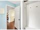 Convenient mudroom with coat hooks, a storage bench, and easy access to the home's interior at 1095 Williamsburg Ln, Zionsville, IN 46077