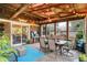 Enclosed brick sunroom with skylights and brick exterior wall at 1095 Williamsburg Ln, Zionsville, IN 46077