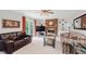 Comfortable living room with a brick fireplace, sliding glass doors, and cozy seating at 1101 High Ct, Carmel, IN 46033