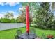 Cozy patio area with an outdoor dining set and umbrella, perfect for relaxing and enjoying the backyard view at 1141 Lazio Ct, Greenwood, IN 46143