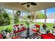 Relaxing screened porch featuring comfortable seating, stylish decor, and a view of the backyard at 1141 Lazio Ct, Greenwood, IN 46143