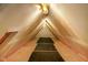 A well-lit attic with a unique design and functional space at 12142 N Paddock Rd, Camby, IN 46113