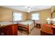 Comfortable bedroom featuring cozy decor, two windows, and plenty of space at 12142 N Paddock Rd, Camby, IN 46113