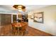 Cozy dining area open to the kitchen with beautiful wood table at 12142 N Paddock Rd, Camby, IN 46113