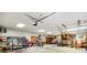 Large garage featuring overhead lighting and ample space for multiple vehicles at 12142 N Paddock Rd, Camby, IN 46113