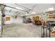 Spacious garage with ample storage and lighting, perfect for projects and organization at 12142 N Paddock Rd, Camby, IN 46113